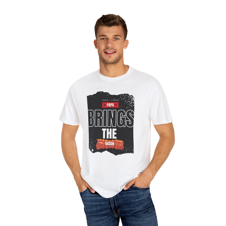 Unisex garment-dyed T-shirt with "Papa Brings the Bacon" design, perfect gift for dads.