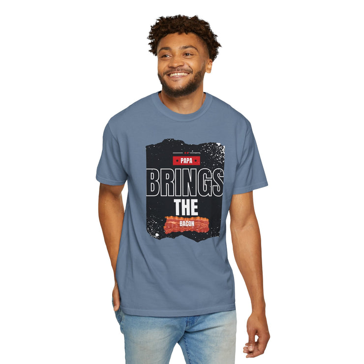 Unisex garment-dyed T-shirt featuring "Papa Brings the Bacon" design, perfect gift for dads.