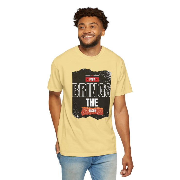 Papa Brings the Bacon unisex garment-dyed T-shirt modeled by a man, perfect gift for dads.