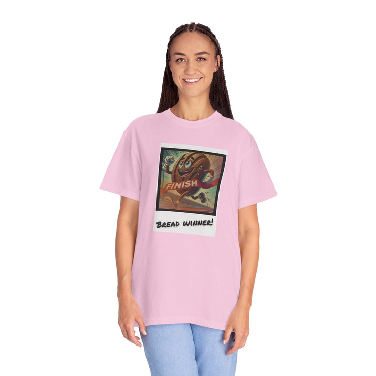 Unisex Bread Winner T-Shirt featuring playful art, vibrant pink color, 100% US cotton, garment-dyed for softness.