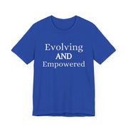 Blue unisex jersey short sleeve tee with "Evolving and Empowered" text.