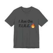 Motivational "I Am On F.I.R.E." unisex T-shirt promoting the F.I.R.E. Movement, featuring a bold design and flame emoji.