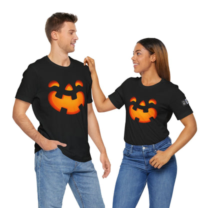 Unisex black Jack O'Lantern Halloween tee with bright orange pumpkin face design, lightweight cotton short sleeve shirt for adults.