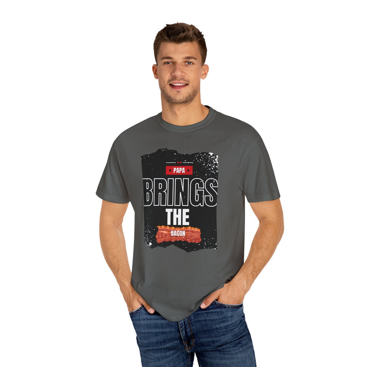 Unisex garment-dyed T-shirt with "Papa Brings the Bacon" design, perfect gift for dads.