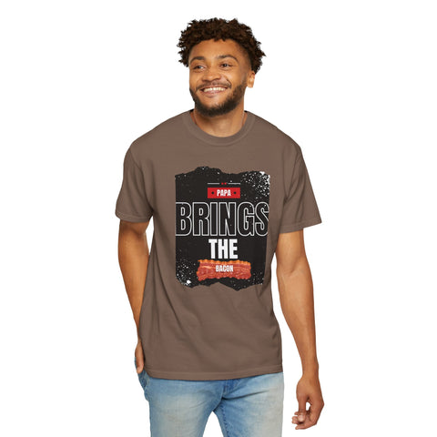Unisex garment-dyed T-shirt with "Papa Brings the Bacon" design, perfect gift for dads.