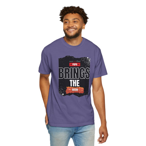 Papa Brings the Bacon unisex garment-dyed T-shirt, perfect gift for dads, displayed on male model.