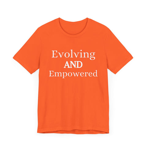 Unisex jersey short sleeve tee with "Evolving and Empowered" text in vibrant orange.
