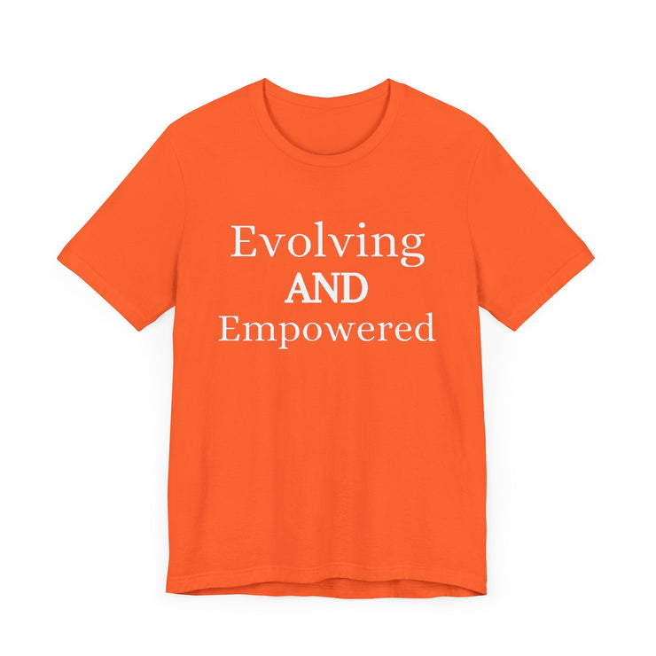 Unisex jersey short sleeve tee with "Evolving and Empowered" text in vibrant orange.