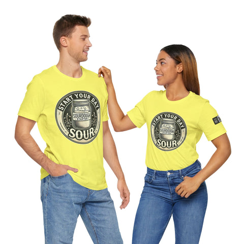 Unisex yellow sourdough starter graphic t-shirt with "Start Your Day Sour" text worn by man and woman