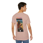 Back view of a man wearing a pink Insta-Gator Fun Unisex T-Shirt with a colorful alligator beach photo print and text on the back.