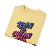 Unisex Garment-Dyed T-shirt folded, featuring "Lean & Clean" graphic design in vibrant colors.