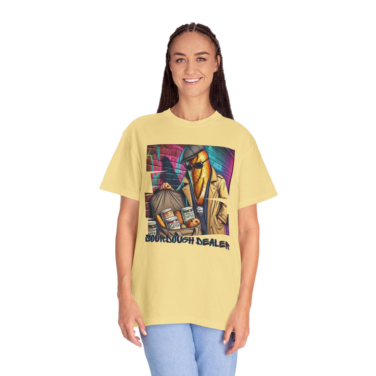 Sourdough Dealer T-Shirt in soft yellow featuring a playful, artistic design, perfect for casual elegance and self-expression.