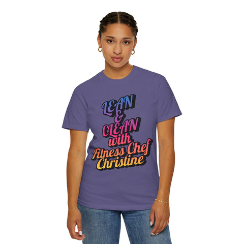 Unisex garment-dyed T-shirt with "Lean & Clean with Fitness Chef Christine" text, casual purple tee.